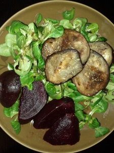 Grilled aubergines and beetroot on lamb's lettuce.
